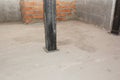 Metal pillar inside new house construction. Metal pillar construction idoors Royalty Free Stock Photo