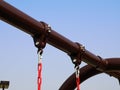 metal pipe and chain swing in a playground, closeup of photo Royalty Free Stock Photo