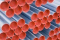 Metal pipes with red caps Royalty Free Stock Photo