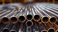 Stack of Metal Pipes on Factory Floor Royalty Free Stock Photo