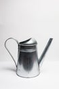 Metal pitcher over white Royalty Free Stock Photo