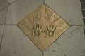 Metal plaque on the walk of fame of Gramado