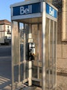 Retro Bell telephone booth on street corner