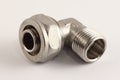 Metal-plastic 20 mm angle press fitting pipe collet connector with G 1/2` thread Royalty Free Stock Photo