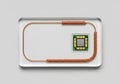 Metal plate with a coiled copper wire and a computer chip is Royalty Free Stock Photo