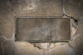 Metal Plate on Concrete Wall Royalty Free Stock Photo