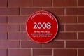 A metal plate displays that Sir Paul McCartney performs live concert at Anfield stadium Royalty Free Stock Photo