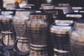 Metal plates and pans hanging from the close-up cup buttermilk Royalty Free Stock Photo