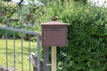 Metal Post Box in Germany in the Garden Royalty Free Stock Photo