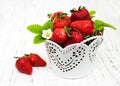 Metal pot with strawberries Royalty Free Stock Photo