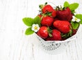 Metal pot with strawberries Royalty Free Stock Photo