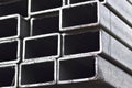 Metal profile pipe of rectangular cross section in packs at the warehouse of metal products