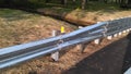 Metal protective barrier with reflective yellow marking sign at newly constructed small bridge 2-C-504. NJ, USA. Ãâ.