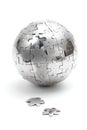 Metal puzzle globe on white background Royalty Free Stock Photo