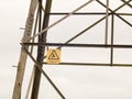 Metal pylon electrical tower sign detail danger hazard yellow de