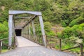 Old rail bridge and tunnel. Karangahake Gorge, New Zealand Royalty Free Stock Photo