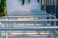 Metal railings in front of gates of Silesian Stadium in ChorzÃÂ³w, Poland. Row of steel rails.