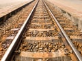 Metal railroad or railway train with rock. Concept of transportation, travel, target, success