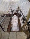 metal ramp for wheelchair entry in Russia in winter.