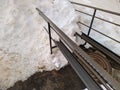 metal ramp for wheelchair entry in Russia in winter.