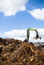 Metal recycling over blue sky, landfill