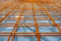 Metal reinforcement grid and wood frame for reinforced concrete basement construction Royalty Free Stock Photo