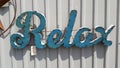 Metal Relax Sign in A Turquoise finish Tack welded