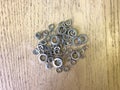 a metal repairs screw washer tool closeup working repair washers fasteners flat spacer close industrial workshop mechanical