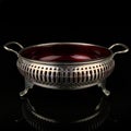 Metal retro sugar bowl on black background Royalty Free Stock Photo