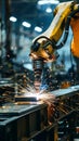 Metal robot arm working in factory warehouse on production line with sparks Royalty Free Stock Photo