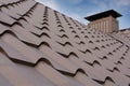 Metal Roof Construction Against Blue Sky. Roofing materials. Metal House roof. Closeup House Construction Building Materials. Royalty Free Stock Photo