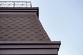 The metal roof of a modern building on a blue sky background Royalty Free Stock Photo