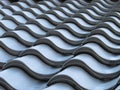 Metal roof tile. Roof tile in line. Row of black tile. Royalty Free Stock Photo