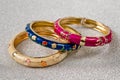 Metal, round, women`s multi-colored bracelets on a hand Royalty Free Stock Photo