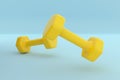 Metal and Rubber Yellow Dumbbell Pair Gym Equipment on Blue Background - 3D Illustration