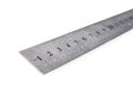 Metal ruler in centimeters or inches. Measuring tool on the white background. Royalty Free Stock Photo