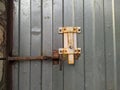 metal and rusty latch lock on a metal fence Royalty Free Stock Photo