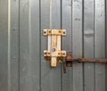 metal and rusty latch lock on a metal fence Royalty Free Stock Photo