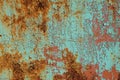 Metal rusty surface with shabby background paint. Texture blue cracked paint on an iron sheet. Royalty Free Stock Photo