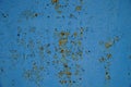 Metal rusty surface with shabby background paint. Texture blue cracked paint on an iron sheet. Metal Corrosion Royalty Free Stock Photo