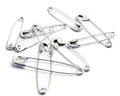 Metal safety pin on white background. Royalty Free Stock Photo