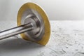 Metal saw, end mill or drill bit with diamond coating makes hole in concrete slab. Industry and construction Royalty Free Stock Photo