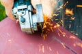 Metal sawing close up with angle grinder Royalty Free Stock Photo