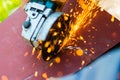 Metal sawing close up with angle grinder Royalty Free Stock Photo