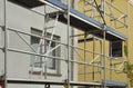 Metal scaffold at residential building under renovation