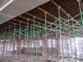 Metal scaffolding is used as a temporary structure that supports works at the construction site.