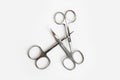 Metal scissors for manicure and pedicure on a white background