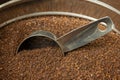 A Metal Scoop In A Metal Can of Coffee Grounds Royalty Free Stock Photo