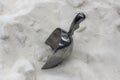 Metal scoop in a pile of sugar. Royalty Free Stock Photo