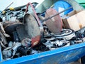 Metal scrap in a waste sorting container Royalty Free Stock Photo